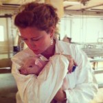 Shushing a piglet...like only a Mama can do!